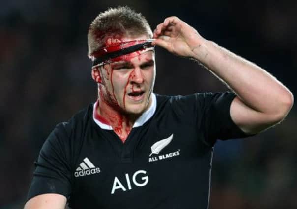 Full-blooded encounter: Sam Cane was in the wars. Photograph: Michael Bradley/AFP/Getty Images