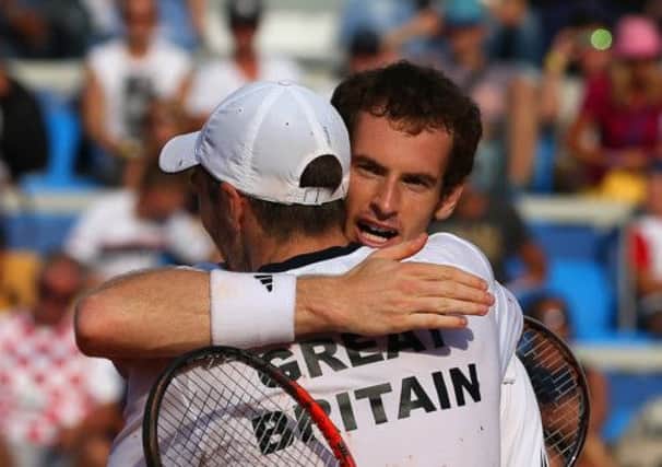 Andy Murray and Colin Fleming celebrate their win against Ivan Dodig and Mate Pavic. Picture: Getty