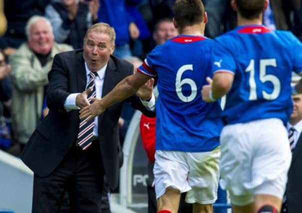 Rangers manager Ally McCoist celebrates Lee McCulloch's stunning second goal. Picture: SNS