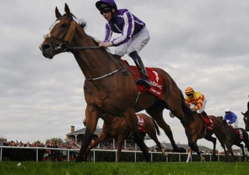 Joseph OBrien rides Leading Light to victory in the Ladbrokes St Leger at Doncaster. Picture: Getty
