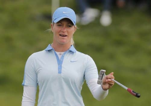 Suzann Pettersen of Norway studies her putt before playing on the 18th hole. She won by two shots ahead of Lydia Ko. Picture: AP