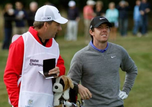 Rory McIlroy, pictured with caddie J.P. Fitzgerald, was well down the field. Picture: Getty