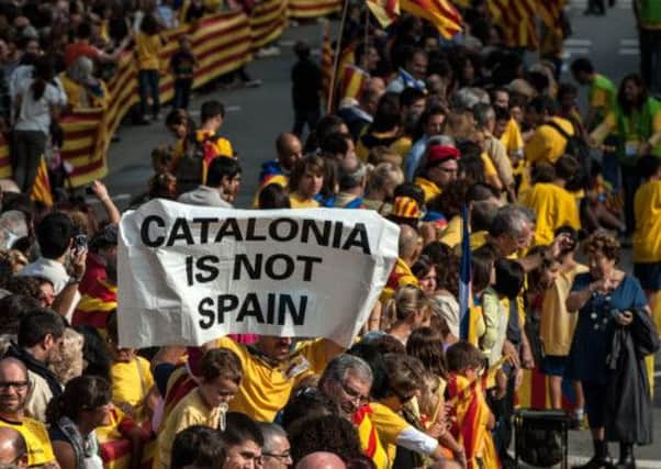 Demonstrators in favour of Catalonian independence march during The National Day of Catalonia. Picture: Getty