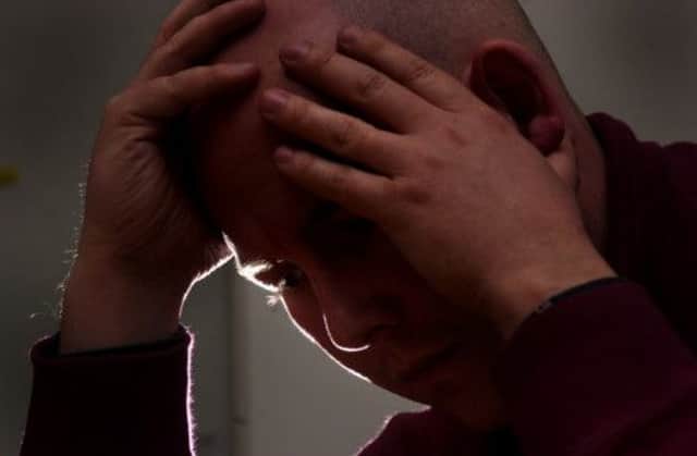 Scots have been urged to talk more about their feelings. Picture (posed by model): TSPL