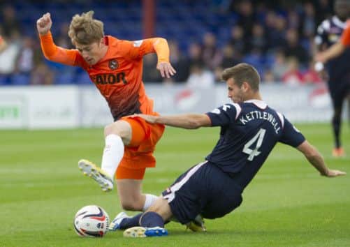 Ryan Gauld evades the attentions of County's Stuart Kettlewell. Picture: SNS