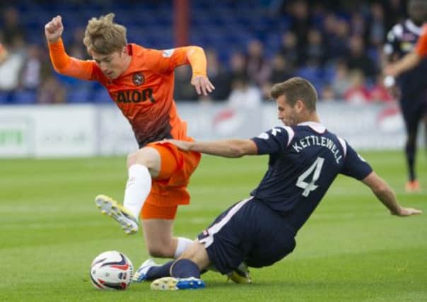 Ryan Gauld evades the attentions of County's Stuart Kettlewell. Picture: SNS
