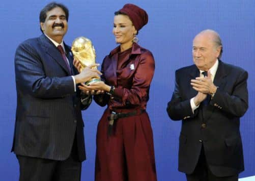 Emir of Qatar Sheikh Hamad bin Khalifa Al-Thani and his wife Sheikha Moza bint Nasser Al-Missned at the announcement of the Qatar World Cup. Picture: Getty