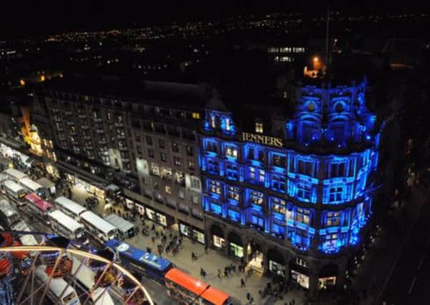 Jenners Department Store, bathed in blue light during the Christmas celebrations in 2012. Picture: Kate Chandler/TSPL