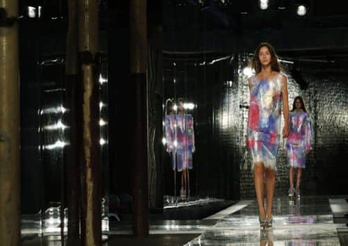 A model presents a creation from the Christopher Kane Spring/Summer 2014 collection. Picture: Reuters