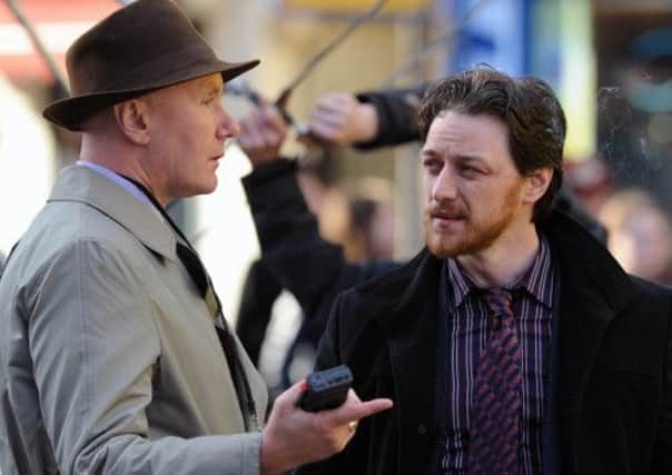 Irvine Welsh and James McAvoy on the set of Filth in Edinburgh's Grassmarket. Picture: Ian Rutherford