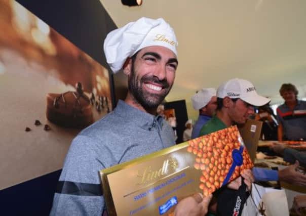 Spains Alvaro Quiros was shown how to make chocolate by tournament sponsors Lindt. Picture: Chris Harris/Getty