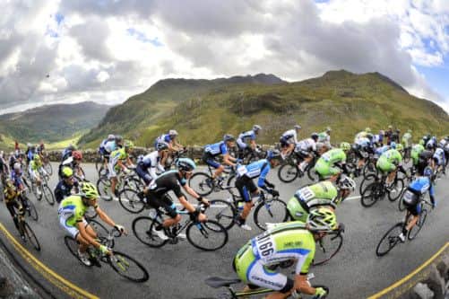 The peloton approaches the top of PenyPass on stage four of the Tour of Britain with the Snowdon Massif in the background. Picture: Getty