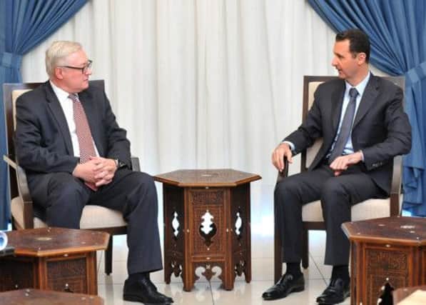 Russias deputy foreign minister Sergei Ryabkov meets Syrian president Bashar al-Assad in Damascus yesterday. Picture: AP