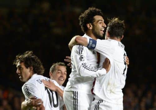 Basels Mohamed Salah (centre) celebrates with team-mates after scoring against Chelsea. Picture: Reuters