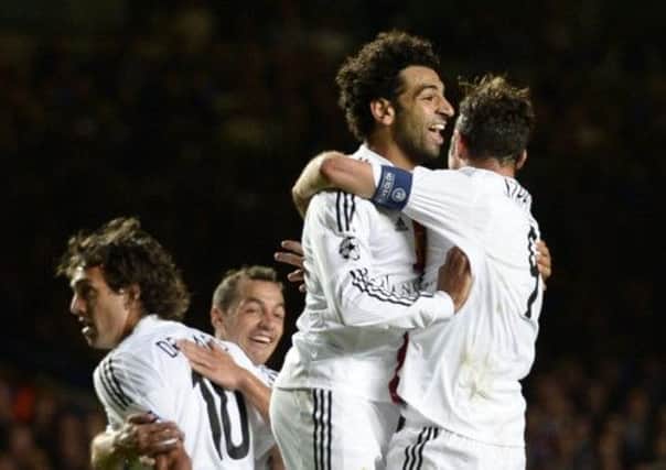 Basels Mohamed Salah (centre) celebrates with team-mates after scoring against Chelsea. Picture: Reuters