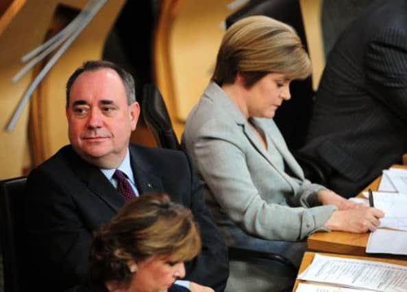 Alex Salmond and his deputy Nicola Sturgeon listen to the debate. Picture: Ian Rutherford
