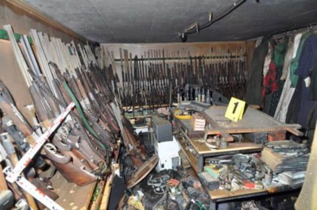 The hoard of guns  many of them stolen from other hunters huts  found in Hubers farmhouse. Picture: AP