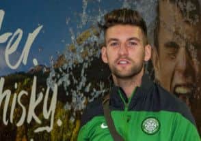 Mulgrew arrives home in Glasgow. Picture: SNS