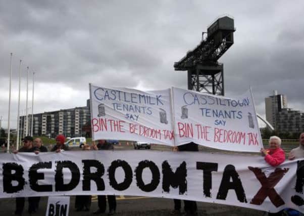 Glasgow residents stage a demonstration over bedroom tax outside the Liberal Democrat conference. Picture: PA