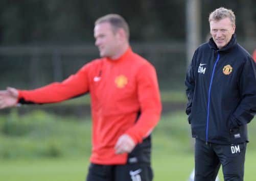 David Moyes has managed to hang on to Wayne Rooney, who last week scored his 200th goal for United. Picture: PA