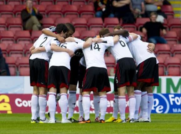 Aberdeen players get together before the Partick Thistle match. Picture: SNS