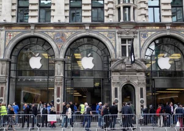 Customers keen to buy the new iPhone 5S fill the pavement outside the busy Apple store on Regent Street in OLondon. Picture: Getty