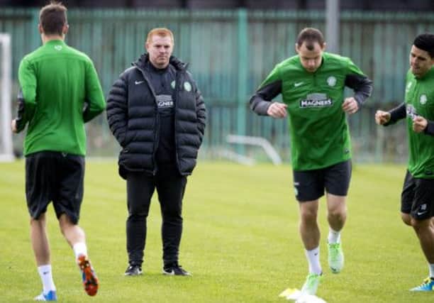 Celtic manager Neil Lennon casts an eye over training. Picture: SNS