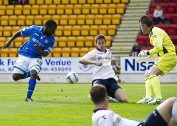 Nigel Hasselbaink, left, in action for St Johnstone. Picture: SNS