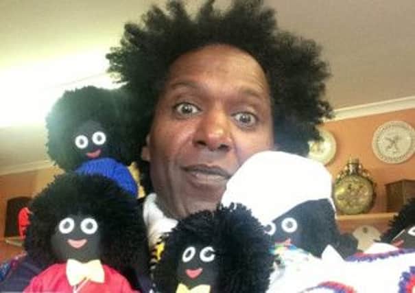 Lemn Sissay with the controversial Lerwick golliwogs. Picture: Hemedia/SWNS