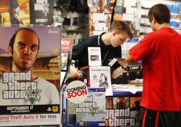 The universe Grand Theft Auto V creates is cruel and misogynistic, with women existing only to be rescued or mistreated. Picture: Reuters