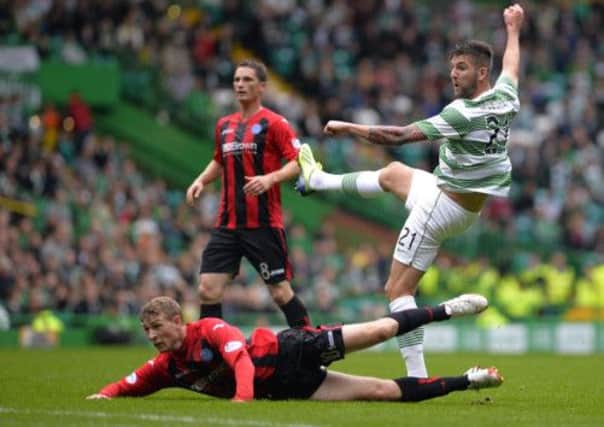 Charlie Mulgrew doubles Celtic's lead against St Johnstone. Picture: Reuters