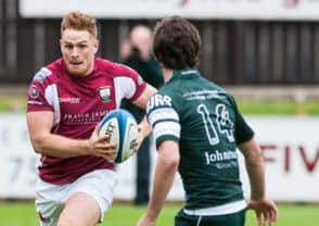 Graham Speirs looks prepared to take on more than just Hawicks Steven Anderson as he surges forward. Picture: Ian Georgeson