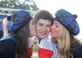 Oisin Murphy celebrates his Ayr win on what proved to be a hugely successful day for the young apprentice. Picture: Grossick Racin