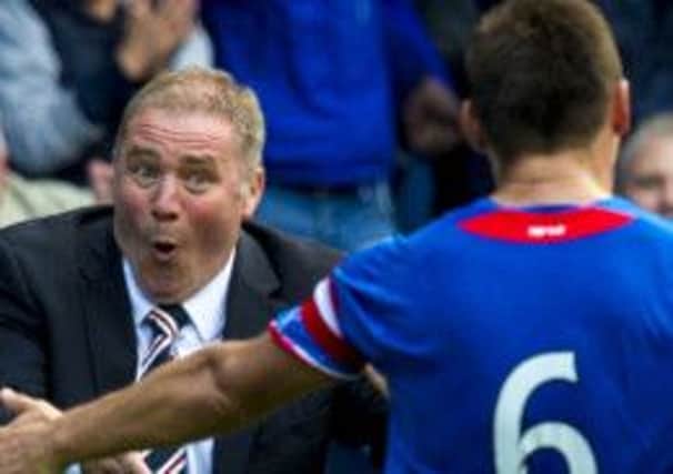 Ally McCoist, pictured with veteran Lee McCulloch, knows Rangers can't put all their faith in youth. Picture: SNS