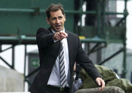 Jackie McNamara is taking Dundee United through a transition period but his players are confident of weathering any storm. Picture: SNS