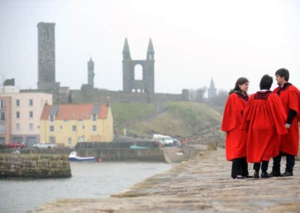 University of St Andrews graduates at the town's harbour. Picture: Jane Barlow