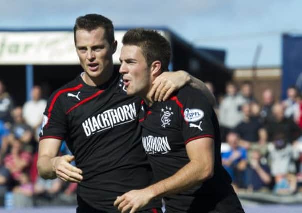Andrew Little (right) is congratulated by Jon Daly after his goal. Picture: SNS