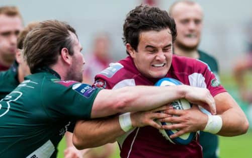 Chris Auld of Gala tries to break through a tackle by Hawicks Lee Armstrong in the Maroons impressive derby win. Picture: Ian Georgeson