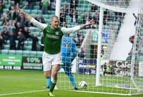 James Collins celebrates his second goal of the game only to be told he was offside and it won't count. Picture: SNS