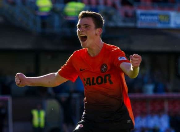 Dundee Utd's Andrew Robertson celebrates putting his side in front. Picture: SNS