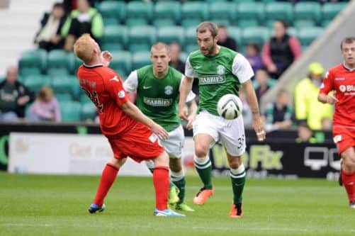 Kevin Thomson, right, has another chance to win the League Cup with Hibs, who won the 2007 final shortly after he left.  Picture: Greg Macvean