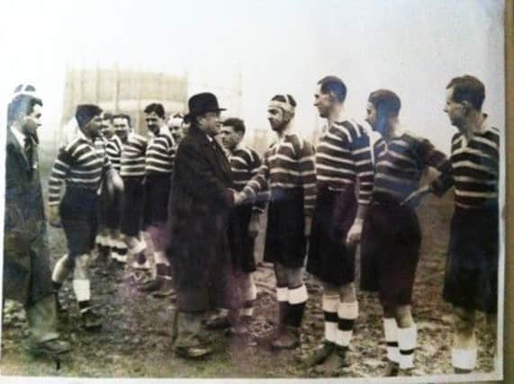 Glasgow Accies, who helped create Glasgow Hawks, line up before a match at the universitys Westerlands playing fields in the 1920s. Picture: Contributed