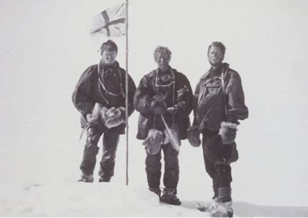 Alistair MacKay, left, Edgeworth David and Douglas Mawson raise the flag at the South Pole. Picture: Complimentary