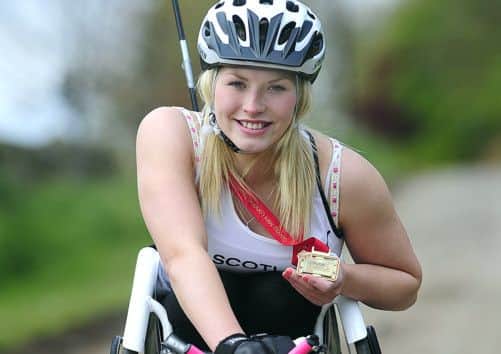 Athlete Samantha Kinghorn holds her medal from the London Marathon. Picture: Alastair Watson