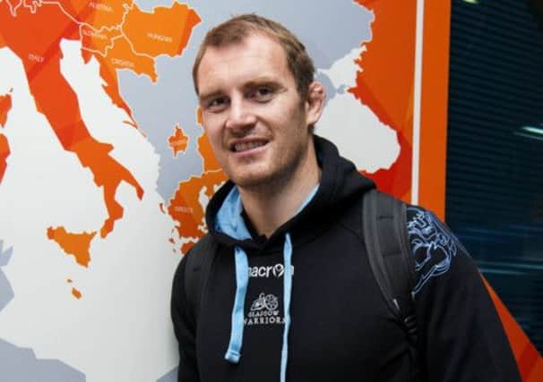 Al Kellock speaks to the press at Glasgow Airport as Warriors prepare to travel to Italy. Picture: SNS