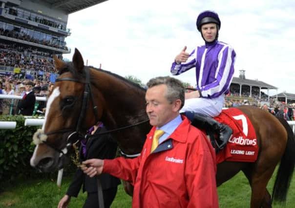Joseph O'Brien riding Leading Light win The Ladbrokes St Leger at Doncaster. Picture: Getty
