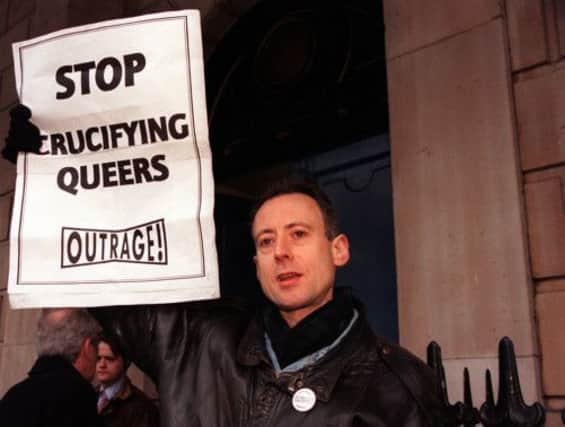 Gay rights activist Peter Tatchell protests at a visit by Cardinal Tom Winning to London in 2000. Picture: PA