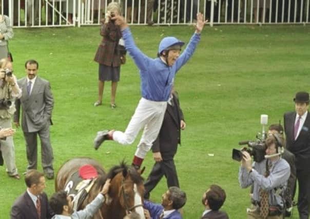 Jockey Frankie Dettori leaps off Mark of Esteem after his seventh win at Ascot on this day in 1996, sweeping the card. Picture: Getty