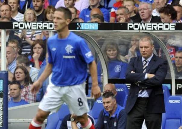 Ally McCoist watches Ian Black in action last season. Picture: Robert Perry