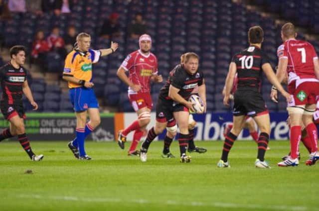 Project: WP Nel with the ball in Edinburghs 22-9 home loss to the Scarlets on Friday. Picture: Joey Kelly